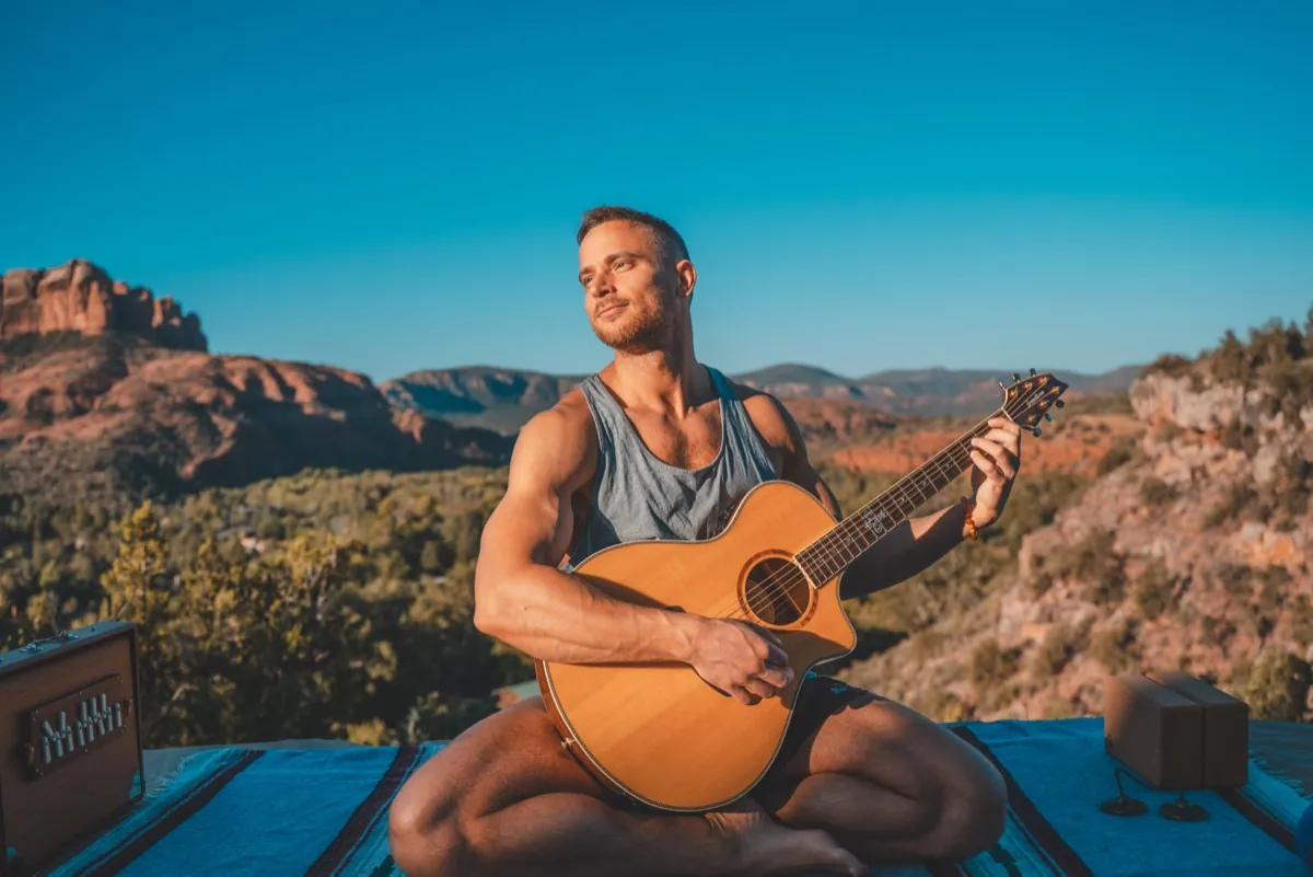 Jack playing guitar at a Sedona retreat